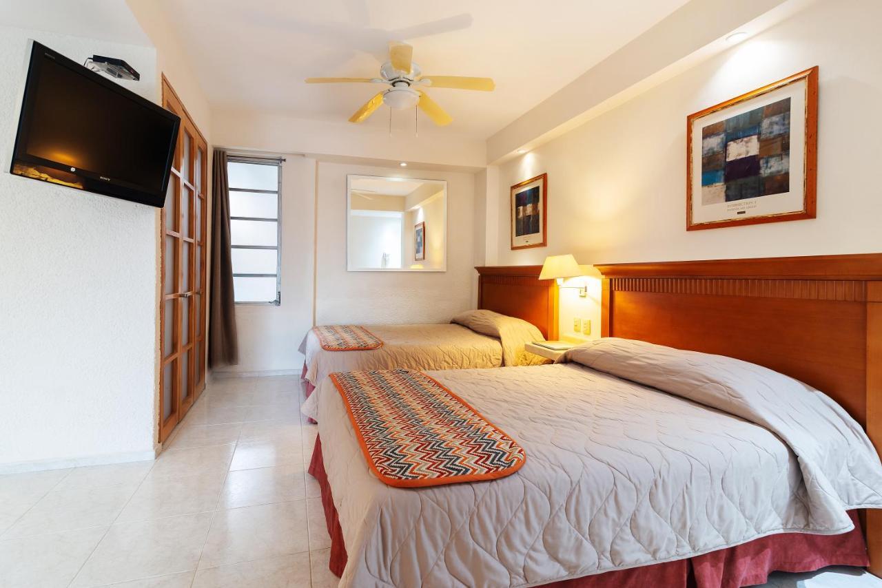Hotel Y Suites Nader Cancún Exterior foto